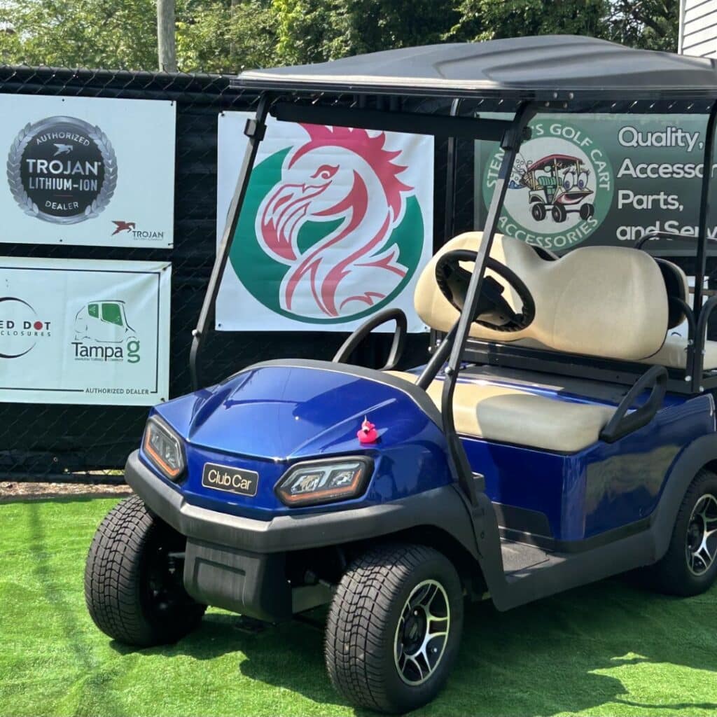 Blue Club Car golf cart with custom accessories and branding at Golf Carts Atlanta.