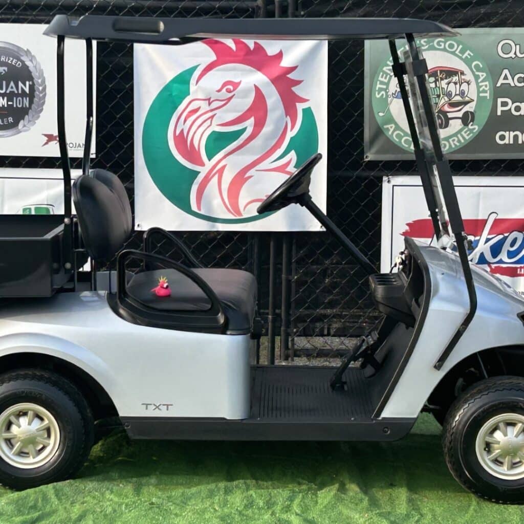 Red Yamaha golf cart with accessories and Golf Carts Atlanta branding.