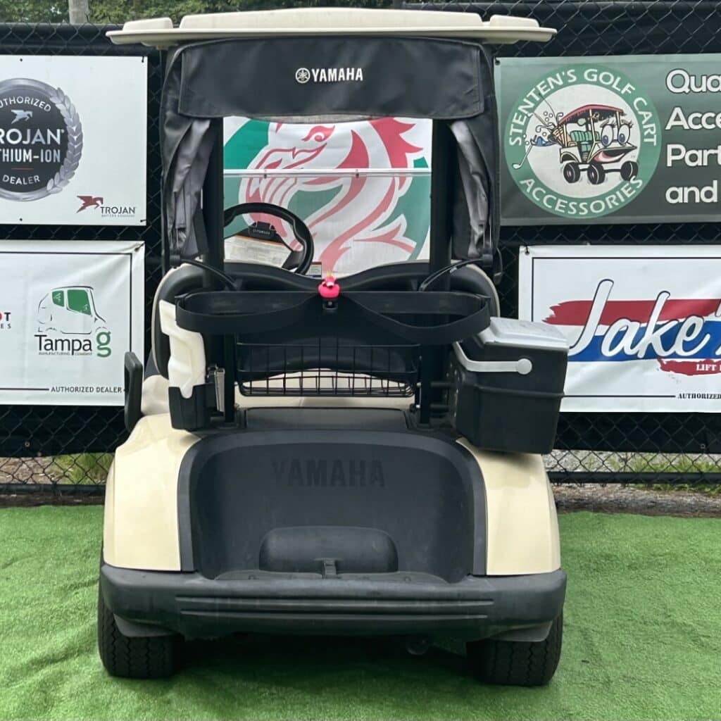 Used Yamaha Drive 2019 golf cart with black roof and new tires.